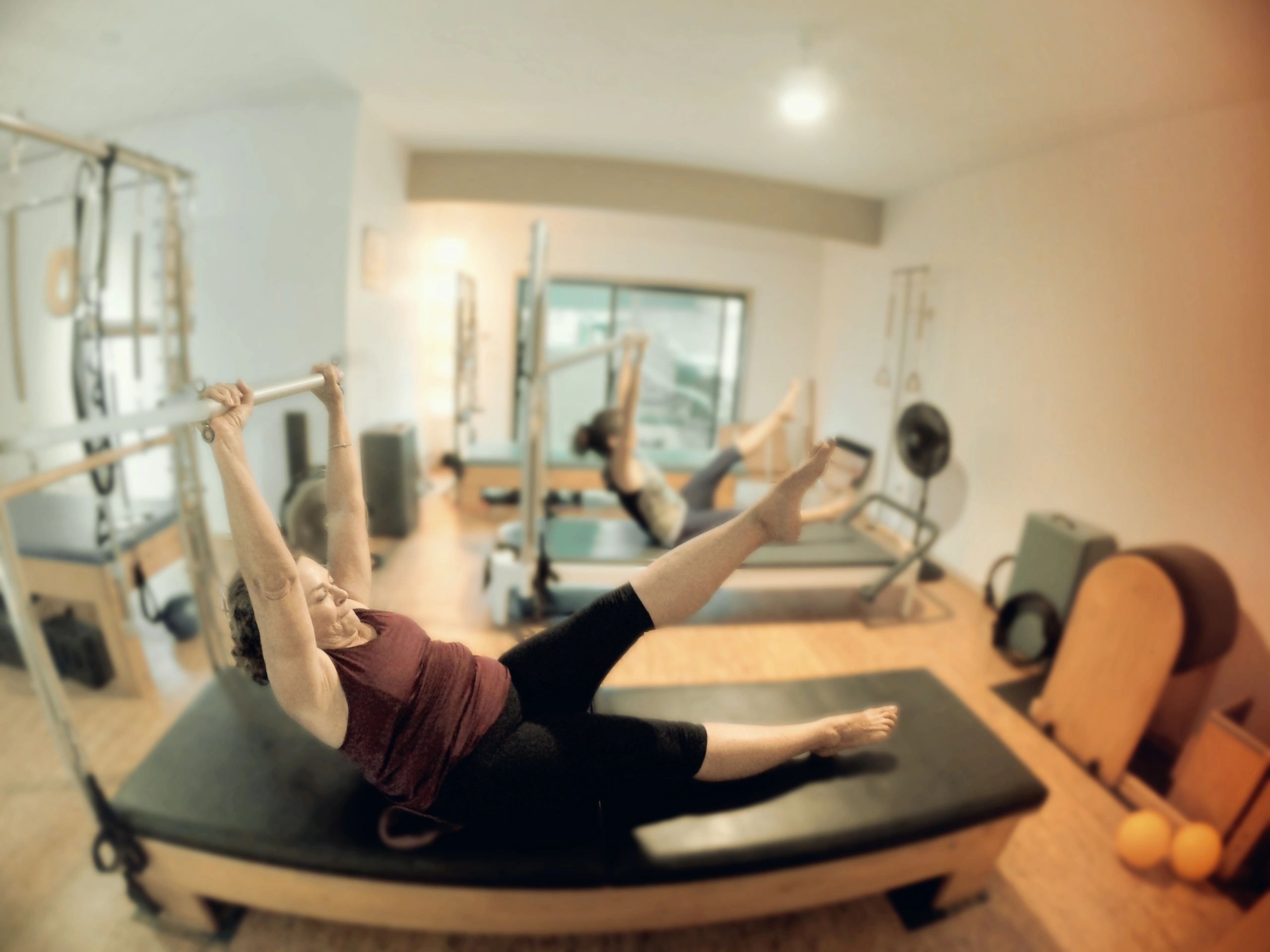 Pilates reformer class in studio